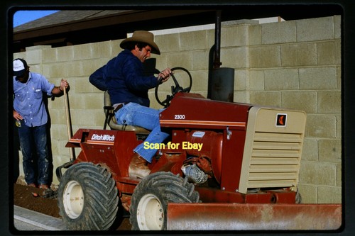 Man ditch witch trencher - man, a